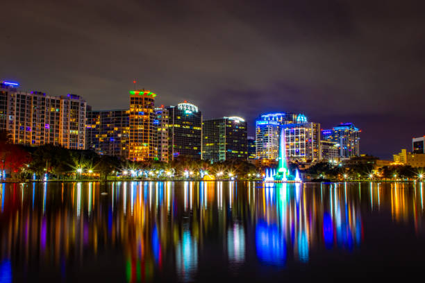 istock Downtown Orlando, Florida skyline at Lake Eola at night 1363505241