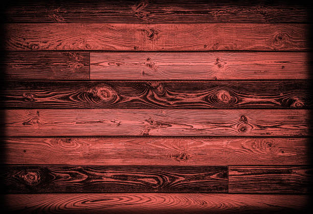 Red background with wooden planks.
