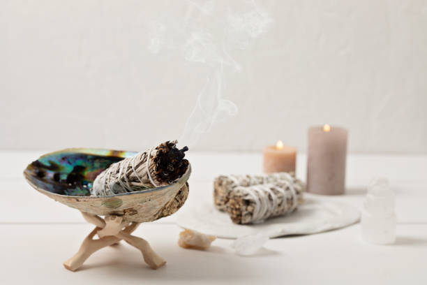 Smudge kit with white sage stick, abalone sea shell. Natural elements for cleansing negative energy