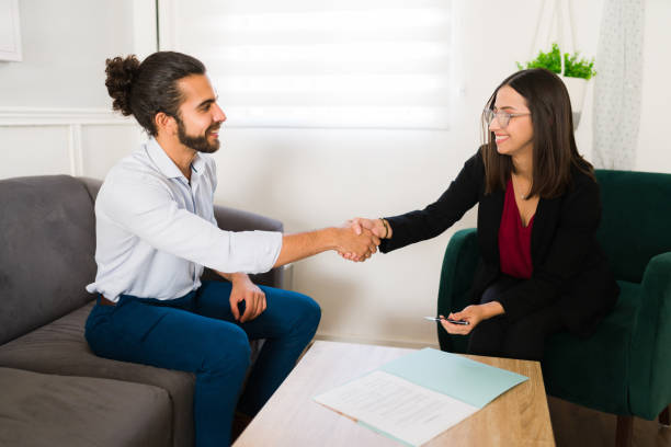 istock Meeting with a female insurance agent 1363521579