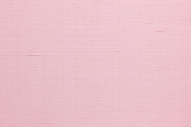 istock Silk fabric wallpaper texture pattern background in light pale sweet pink rose color 1363522263