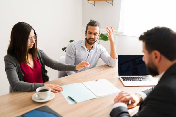 istock Couple reaching a divorce settlement 1363522326