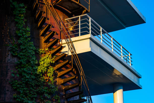 Modern building terrace, building with emergency spiral staircase