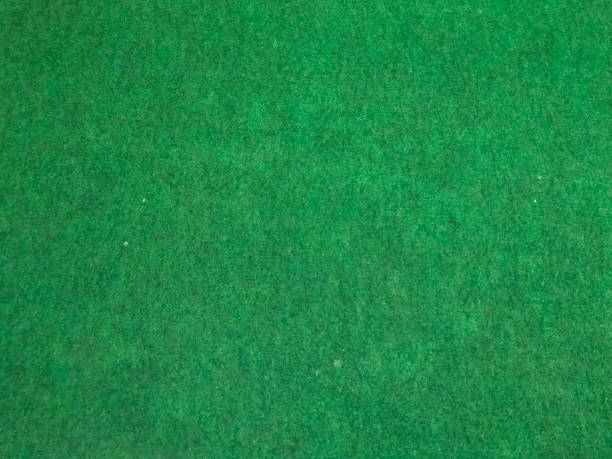 istock Green felt background based on natural texture . Texture of green carpet background . Carpet texture green background 1363534840