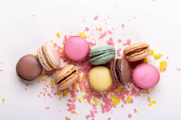 istock Colorful french macarons on pastel background 1363538007