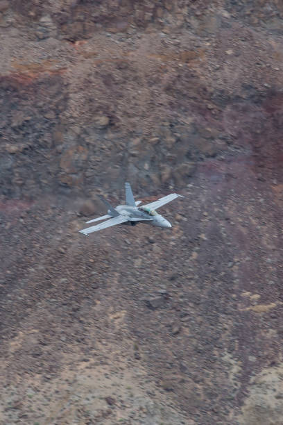 istock Navy F18 low level in Death Valley 1363545720