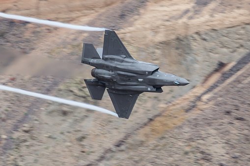 U.S. F35 screaming through Death Valley canyon in full afterburner Rainbow  Canyon Star Wars Canyon