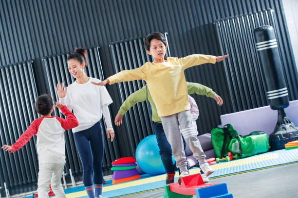 istock Children's physical training under the guidance of the coach 1363551322