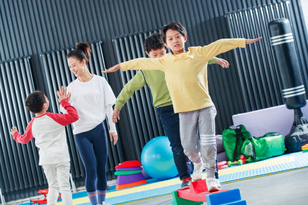 istock Children's physical training under the guidance of the coach 1363556079
