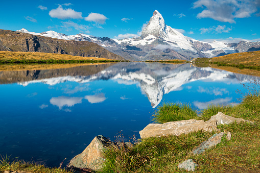 One of the most famous mountain of the world, Matterhorn view from the beautiful Stellisee lake, Zermatt, Canton of Valais, Switzerland, Europe