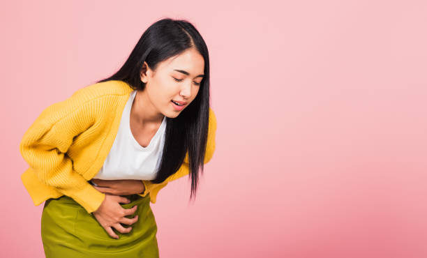 istock Asian beautiful young woman has stomachache 1363559081