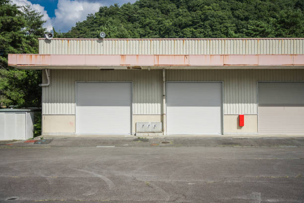 istock Abdnoned and closed warehouse entrance 1363559900