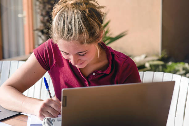 istock young woman or student teleworking on the terrace 1363563907