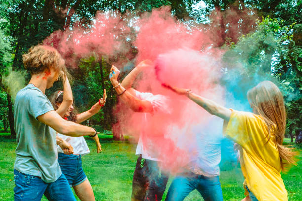 istock young happy friends at holi fest 1363564642