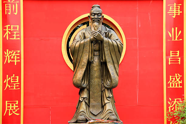 confucius statue wat traimet bangkok statue of confucius in chinatowns wat traimet bangkok thailand thailand temple nobody photography stock pictures, royalty-free photos & images