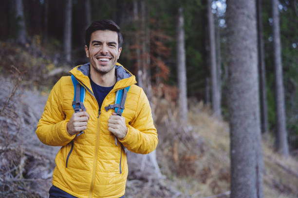 istock Portrait of a smiling man in a forest 1363574370
