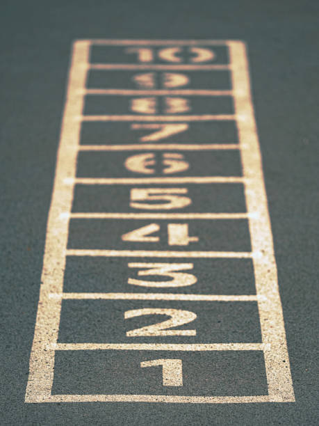 Hopscotch game numbers. Classics game painted on the tarmac stock photo