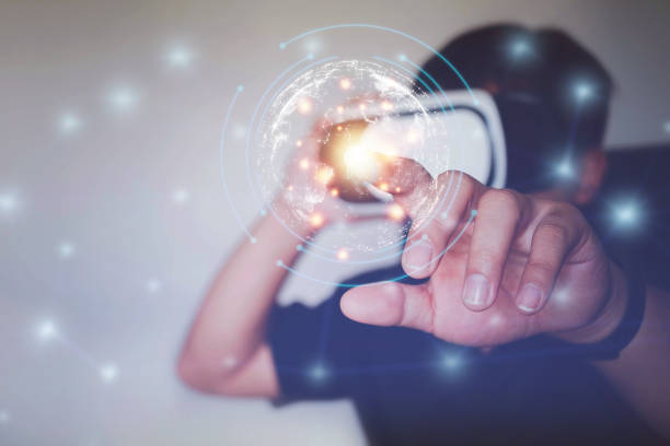 istock man wearing VR glasses virtual Global Internet connection metaverse, Document Management System, online documentation database and process automation to efficiently manage files, future technology. 1363578325