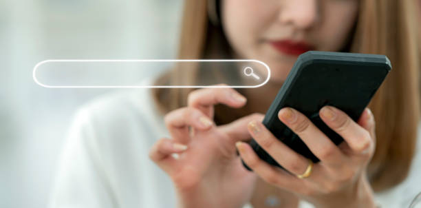 istock Young women using smartphones searching for information data on internet. Data Search Technology Search Engine Optimization. 1363581742