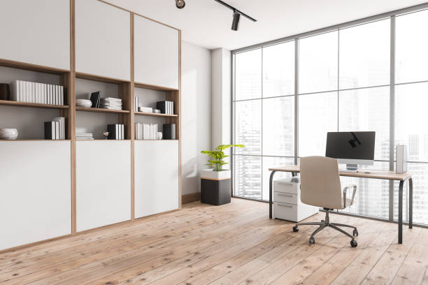 istock White office with pine wood floor. Corner view. 1363584141