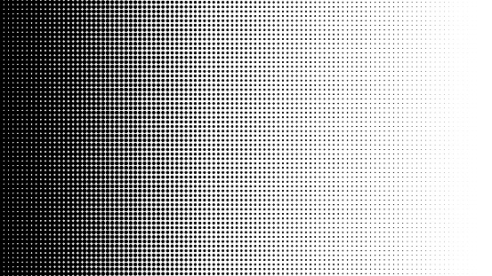 Gradient of halftone black dots on a white background. Pop art texture. Comic background.