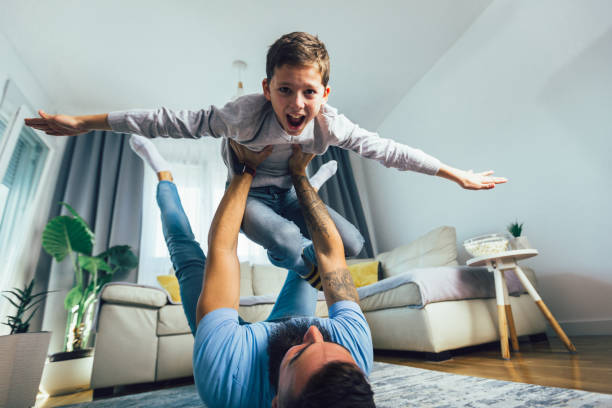istock Father and son having fun at home. 1363584911
