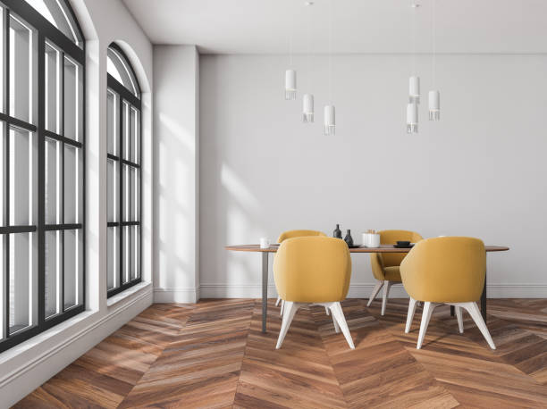 istock White and wooden dining room interior with table and chairs, window 1363586301