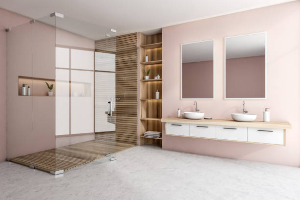 istock Light bathroom interior with shower and two sinks with mirrors and shelf 1363588929