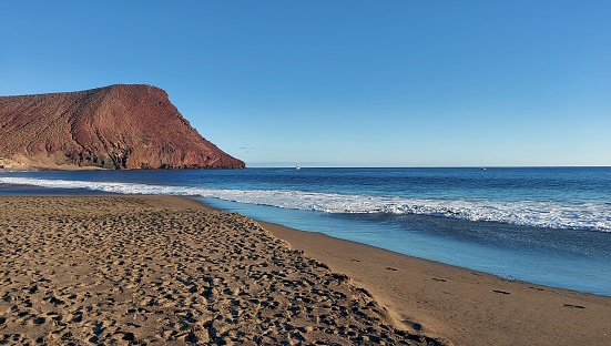 Playazo de Rodalquilar, a golden sand beach lapped by calm water, one of the most beautiful beaches in the Nature Reserve (6 shots stitched)