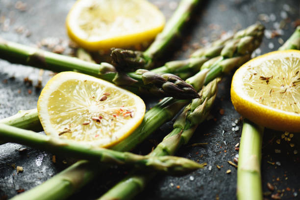 Closeup of asparagus with lemon and spices