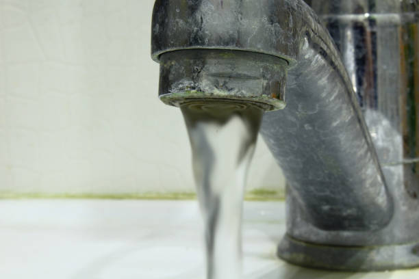 istock Old faucet on the sink. Close-up. Background. 1363596485