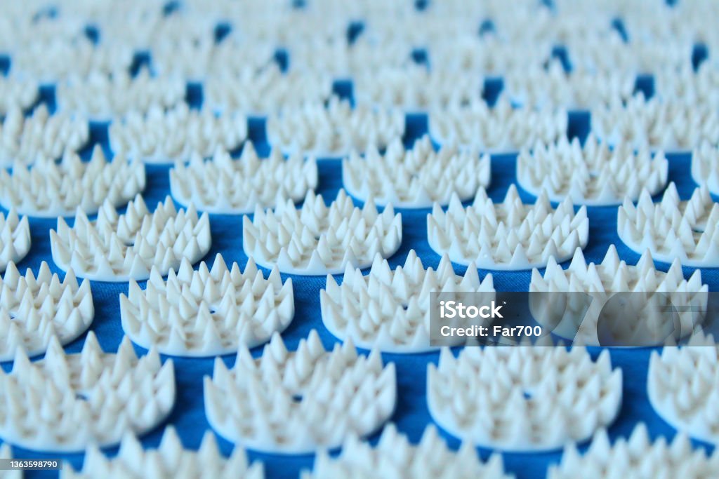 Orthopedic massage mat with spikes. Close-up. Background. Texture. Exercise Mat Stock Photo