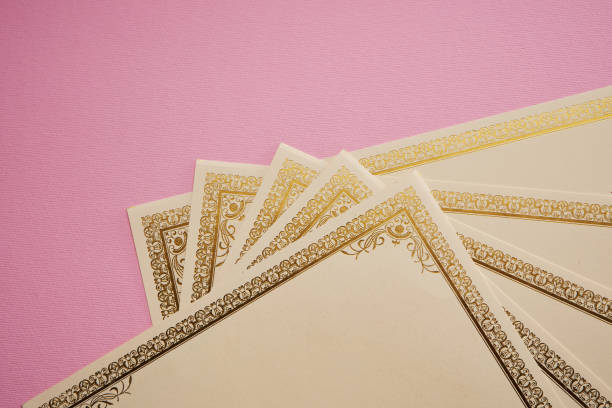 istock blank golden boarder certificate  on pink background 1363600471