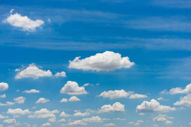 istock beautiful blue sky and white fluffy cloud horizon outdoor for background. 1363600866