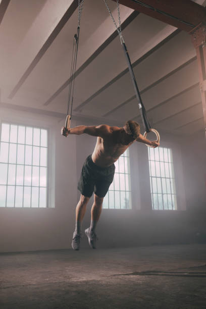 istock An Anonymous Man Exercising on Gymnastic Rings 1363602219