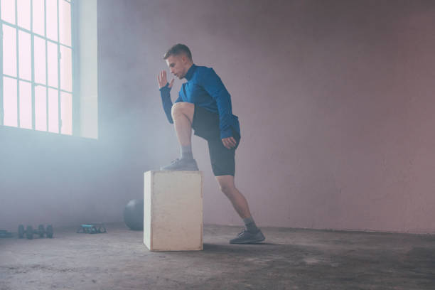 istock Serious Man Exercising in the Gym 1363602249