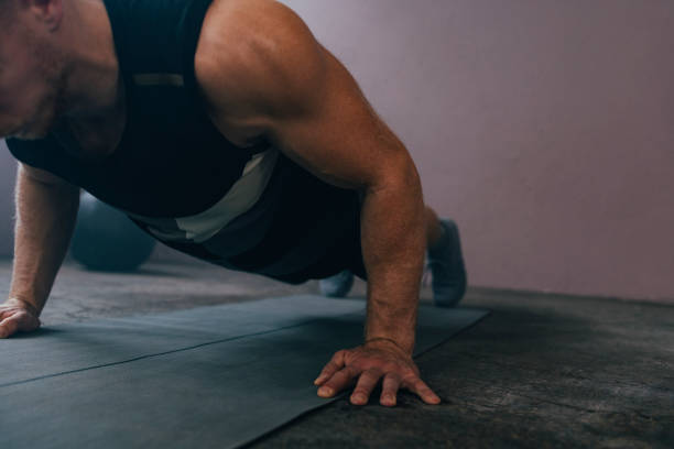 istock An Anonymous Man Exercising in the Gym 1363602266