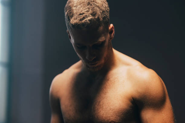 istock Serious Man Exercising in the Gym 1363602280