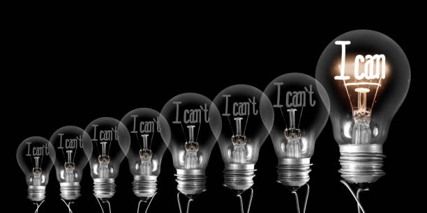 istock Light Bulbs with I Can and I Can't Concept 1363603184
