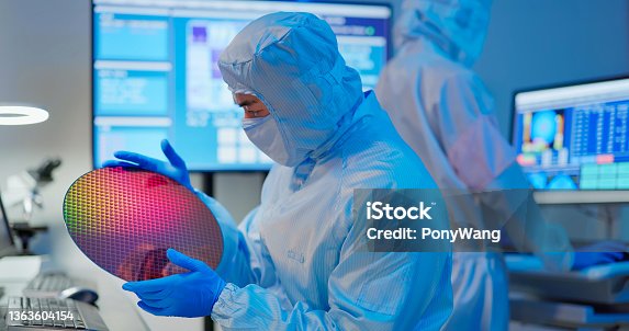 istock technician with wafer 1363604154