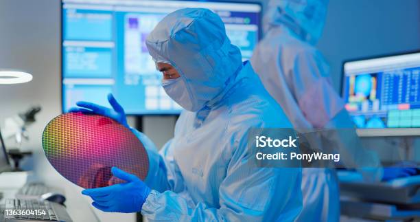 Technician With Wafer Stock Photo - Download Image Now - Semiconductor, Computer Wafer, Manufacturing