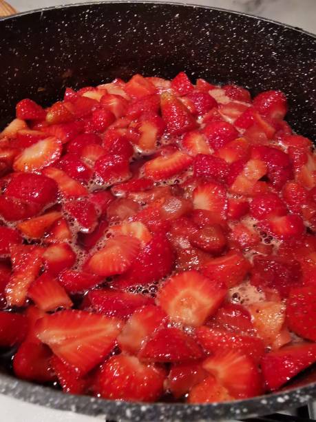 istock Strawberries in a jam pan 1363604268