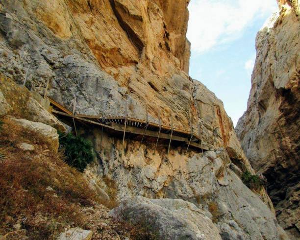 caminito del rey is a passage built on the walls of the gaitanes gorge, - ravine geology danger footpath imagens e fotografias de stock