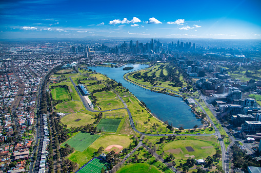 Melbourne, Australia. Horizonte aéreo de la ciudad desde helicóptero. Rascacielos, parque y lago. photo