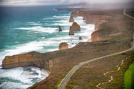 Aerial view of the Twelve Apostles limestone stacks from helicopter, Australia