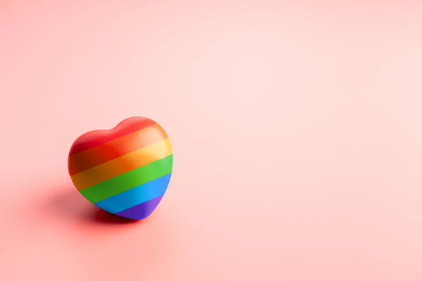 istock LGBTQ flag and symbol on table top view 1363610543