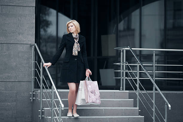 istock Young woman shopping 136361886