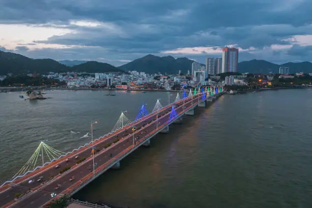 Drone view Tran Phu bridge in Nha Trang city in sunset - Nha Trang city, Khanh Hoa province, central Vietnam