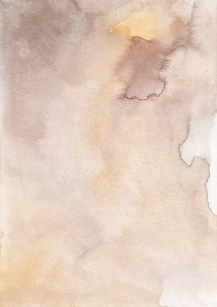 istock Abstract light brown and yellow watercolor background texture, hand painted. Artistic pastel beige and orange backdrop, stains on paper. Aquarelle painting wallpaper. 1363619948