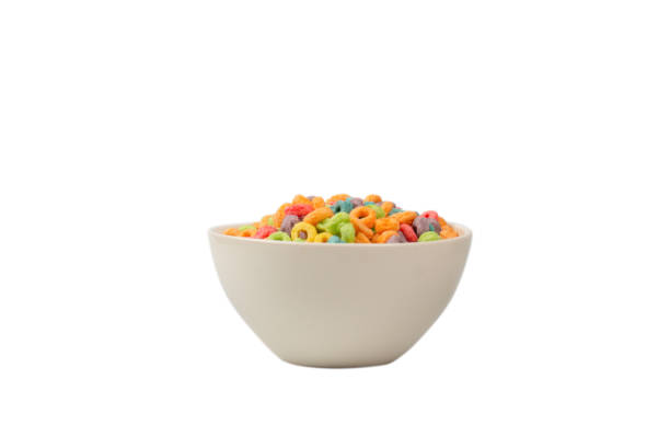 istock Colorful cereal box for morning breakfast. Corn flakes falling to the white bowl. Motion. 1363621030
